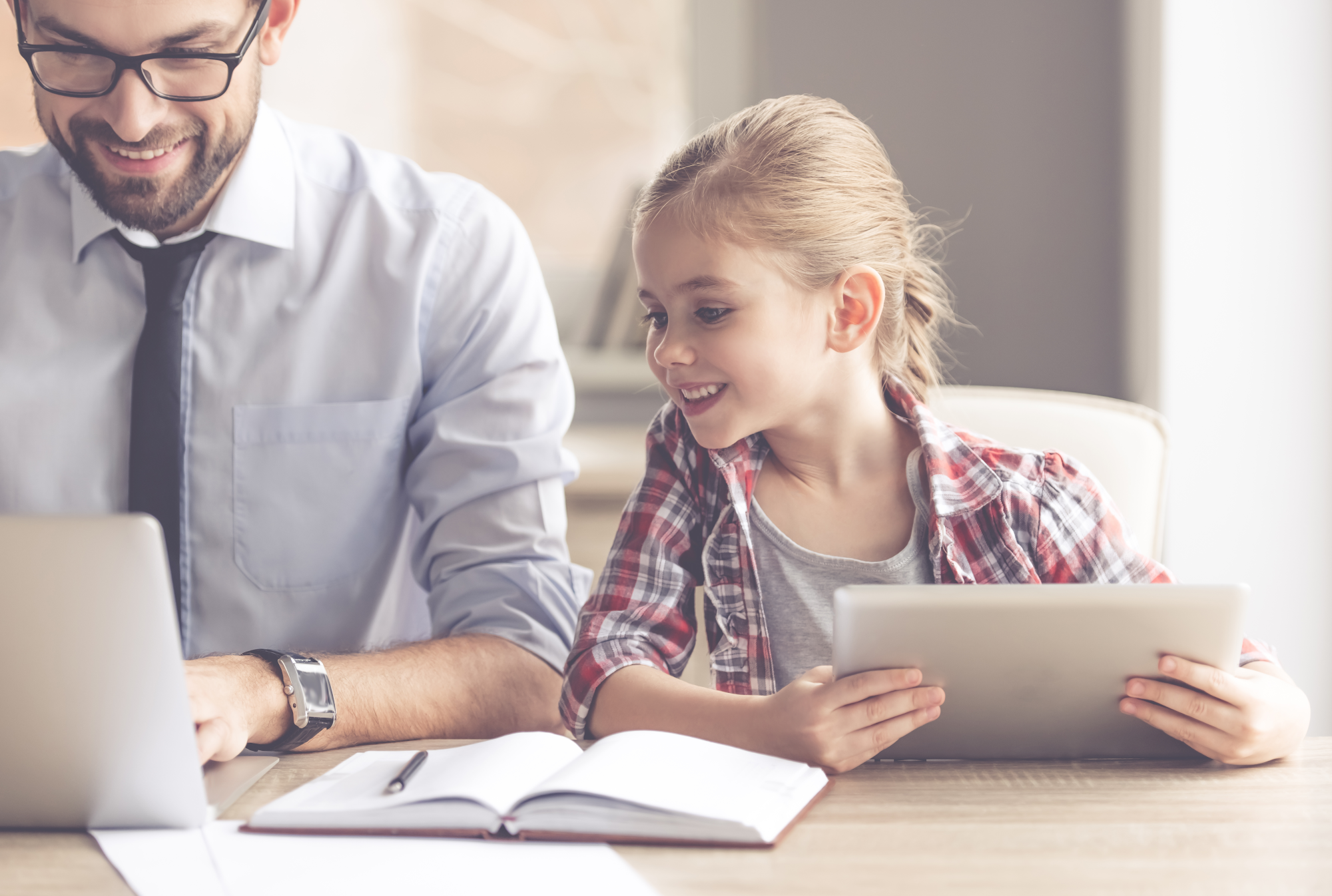 Father and Daughter using a laptop