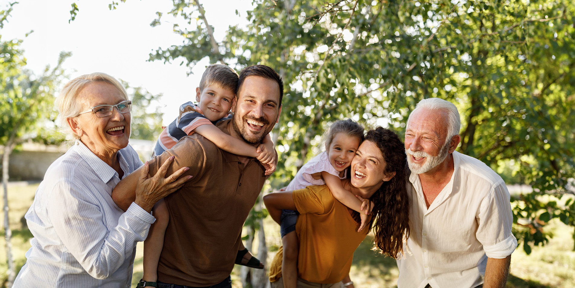 cheerful-extended-family-having-fun-in-nature