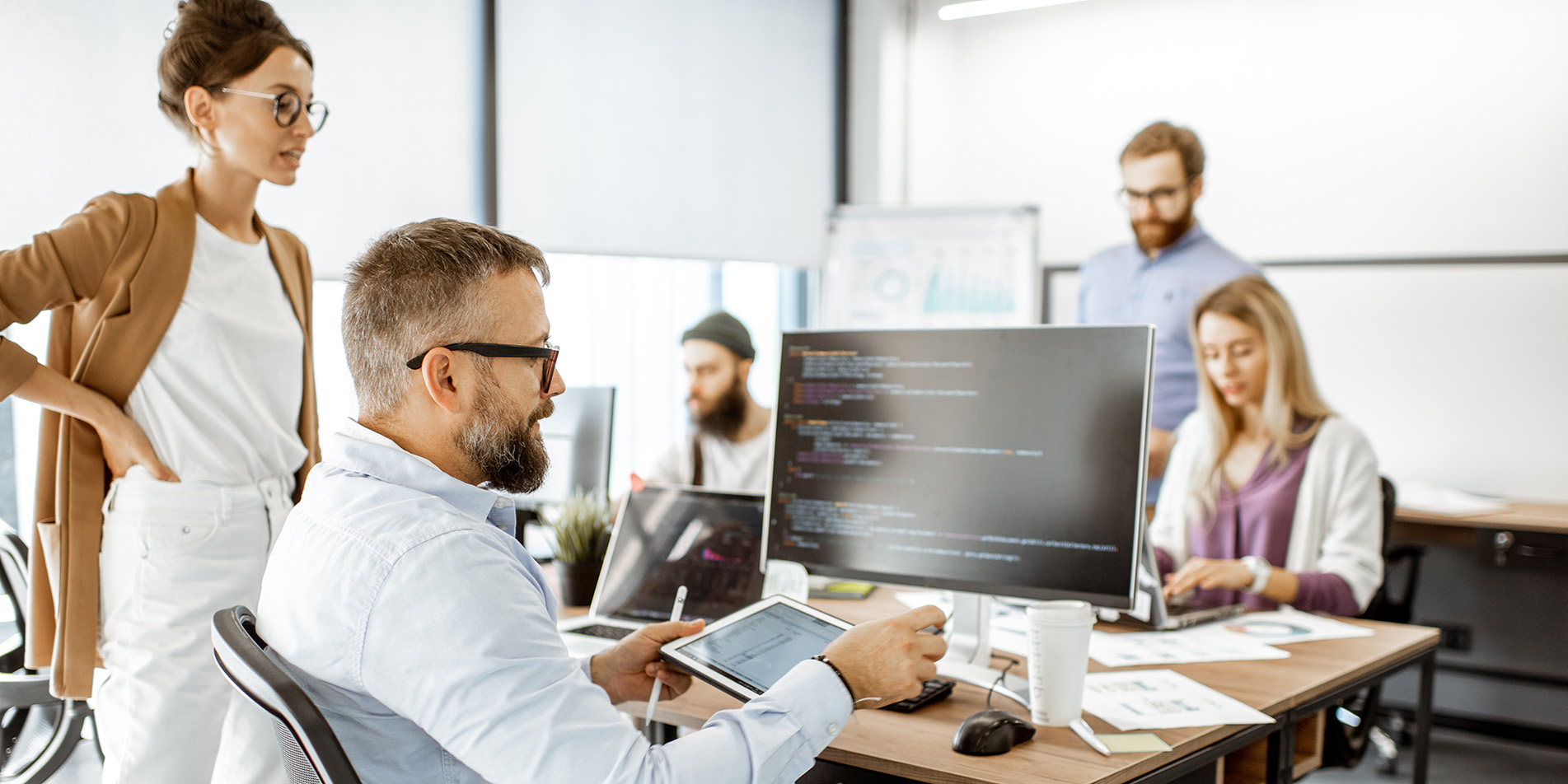 people-in-casual-office-1187869274