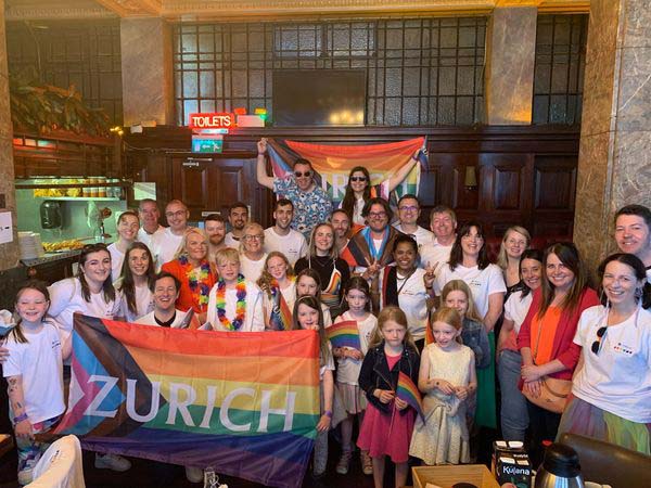 PrideZ group in Dubline with Zurich rainbow flag
